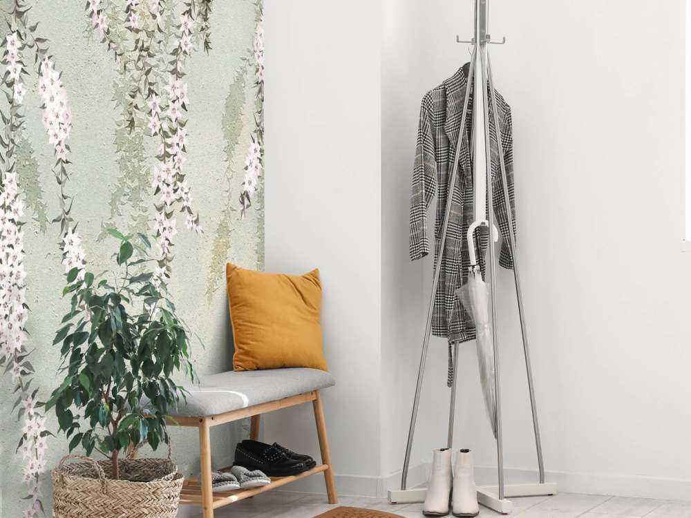 Flower branches on green concrete