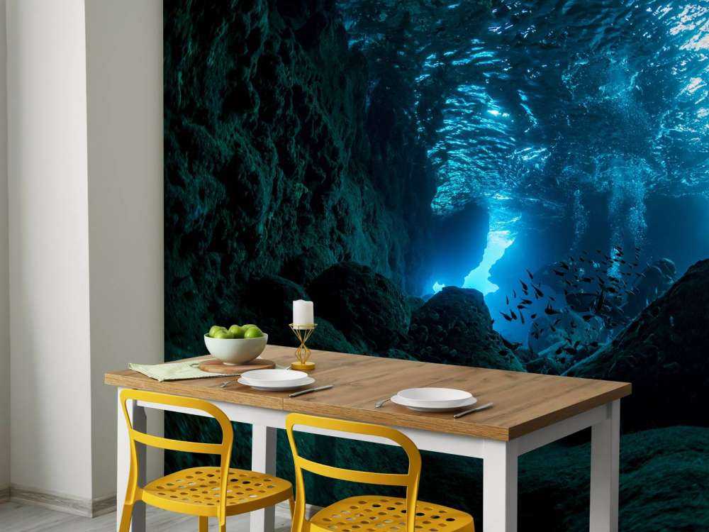 Sunbeams in underwater cave