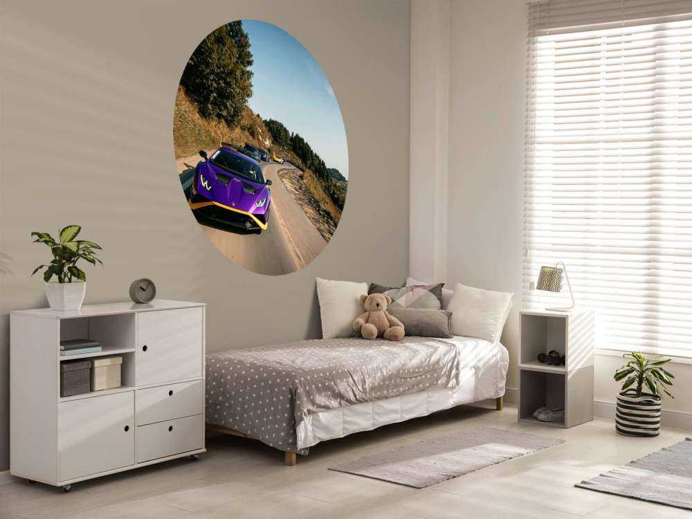 Supercar convoy through the mountains