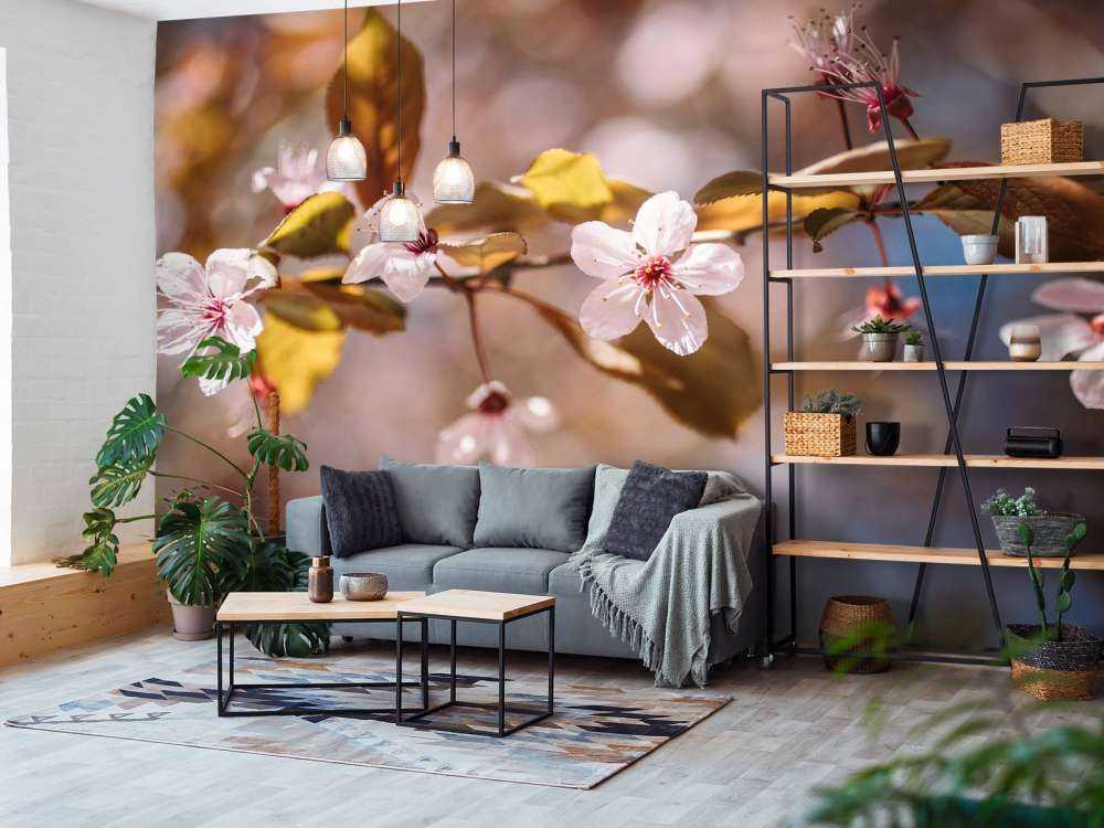 Pink blossoms and brown leaves