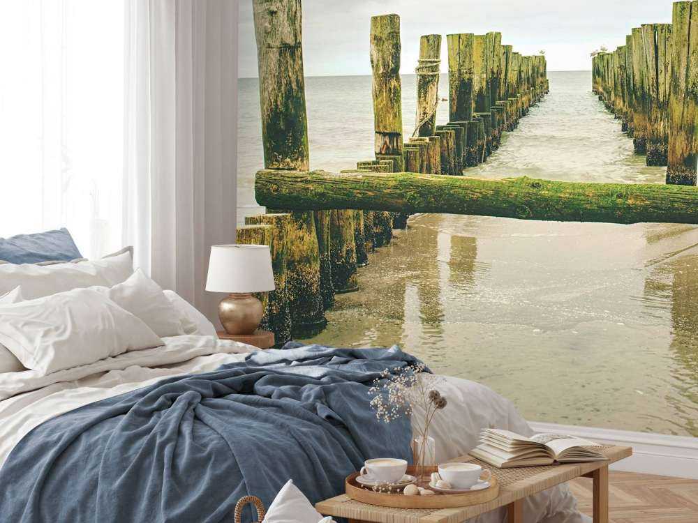 Mossy pile heads in the water