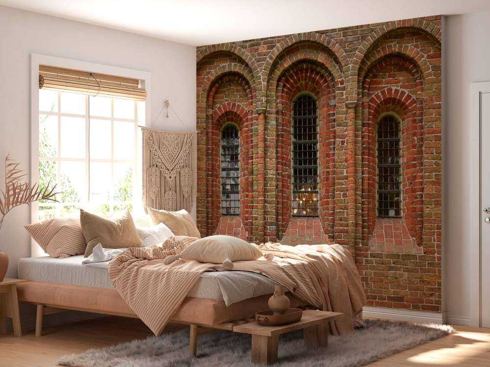 Brick wall with arches and windows