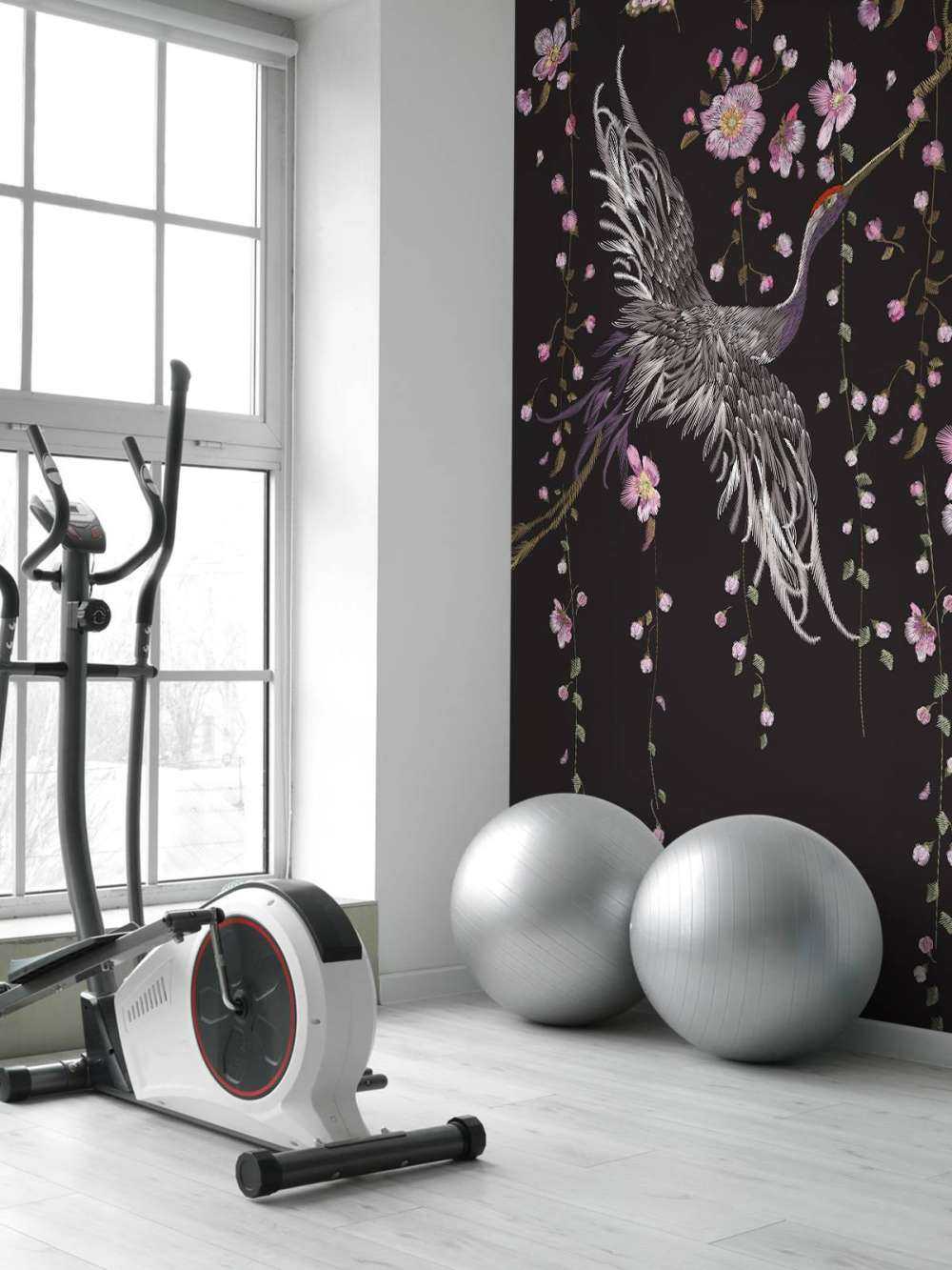 Cranes with pink flowers