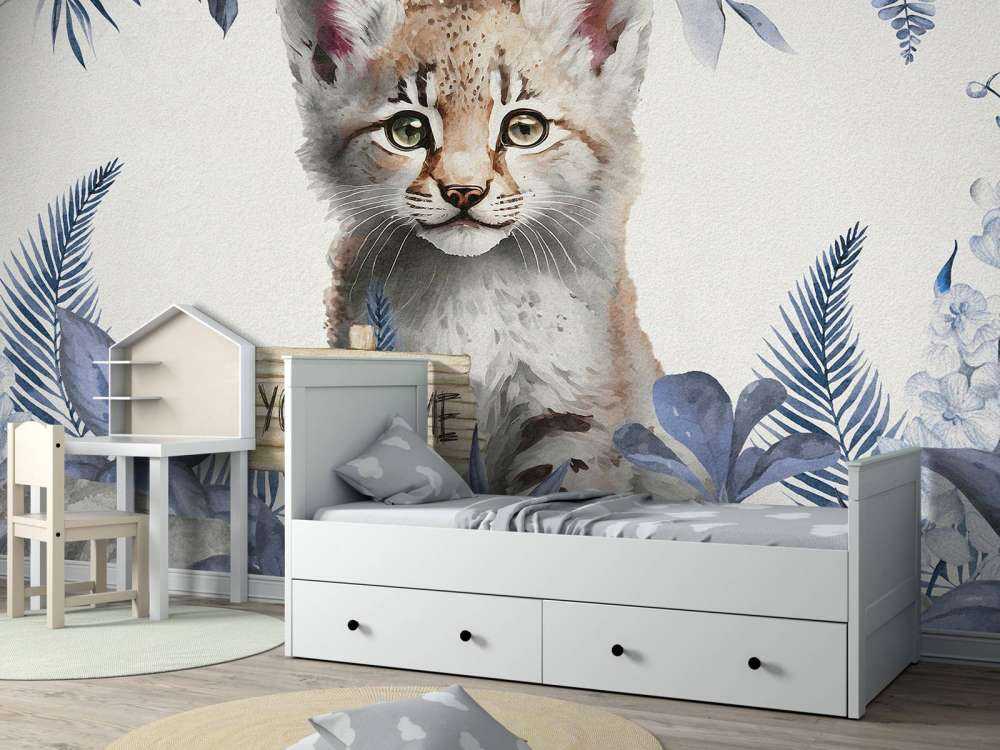 Baby lynx in the jungle blue