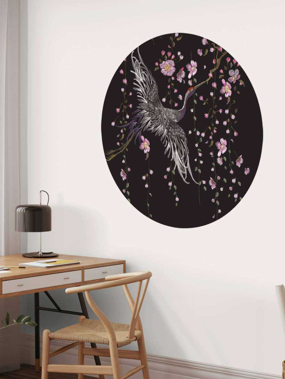 Cranes with pink flowers