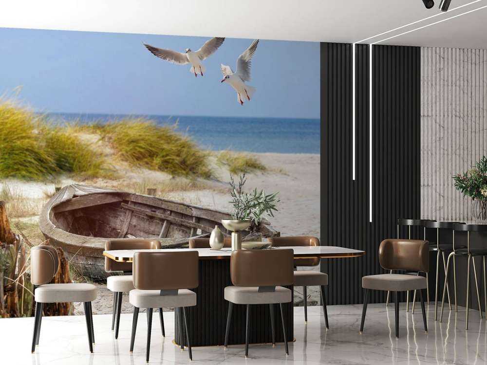 Old fishing boat, seagulls, beach and sea