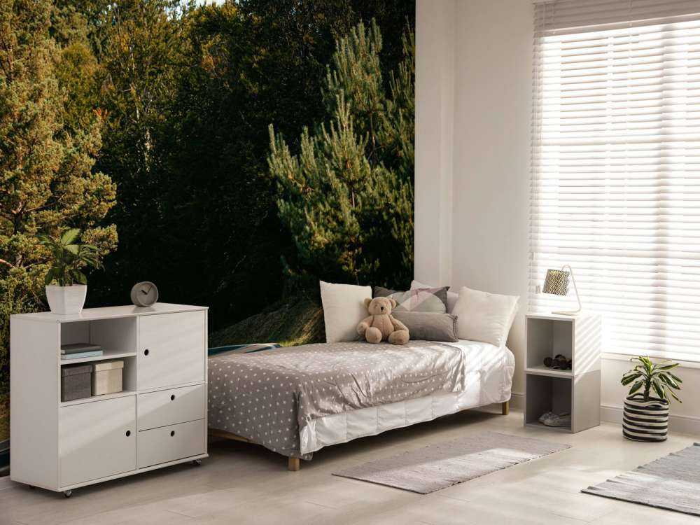 Purple Lamborghini Huracán in woodland landscape