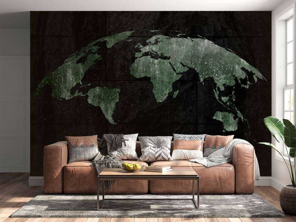 Green world map on concrete