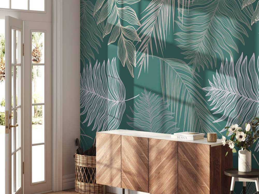 Palm leaf on green background