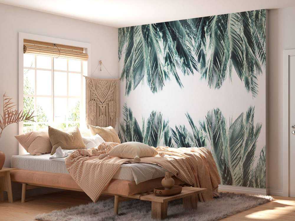 Palm leaves on white background