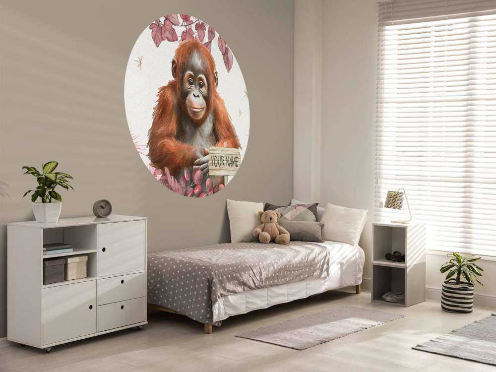 Young orang-utan in the jungle pink