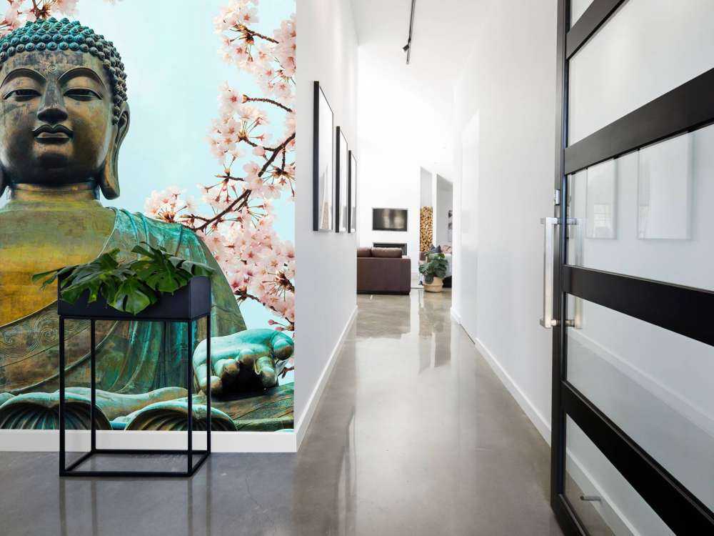 Buddha surrounded with cherry flowers