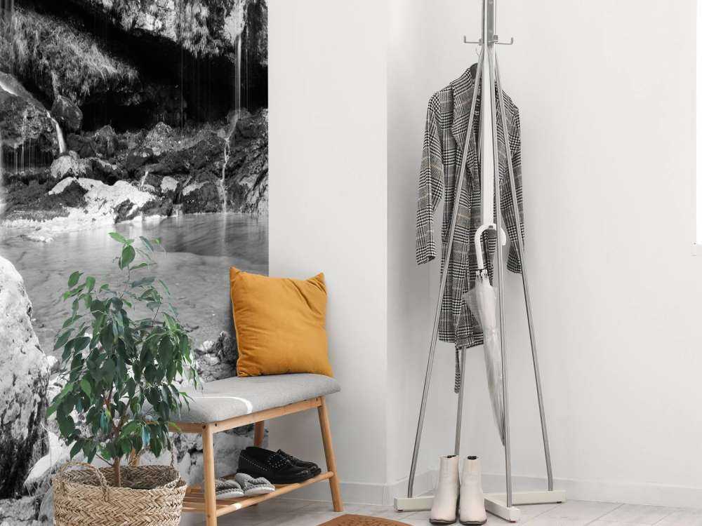 Waterfall over a stone wall