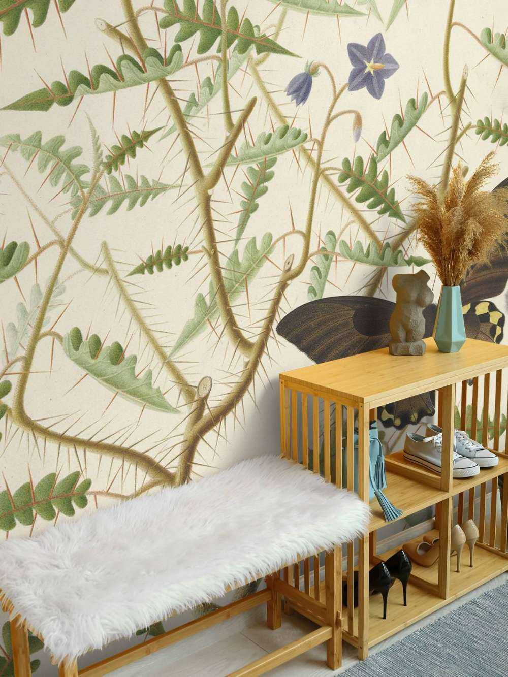 A blossoming shrub with two exotic butterflies