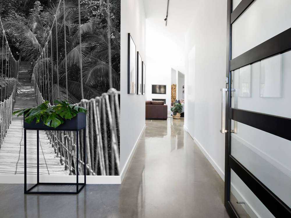 Wooden bridge between the palm trees