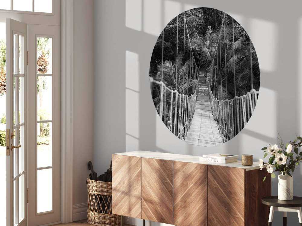 Wooden bridge between the palm trees