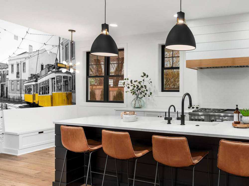 Yellow tram in a black and white street