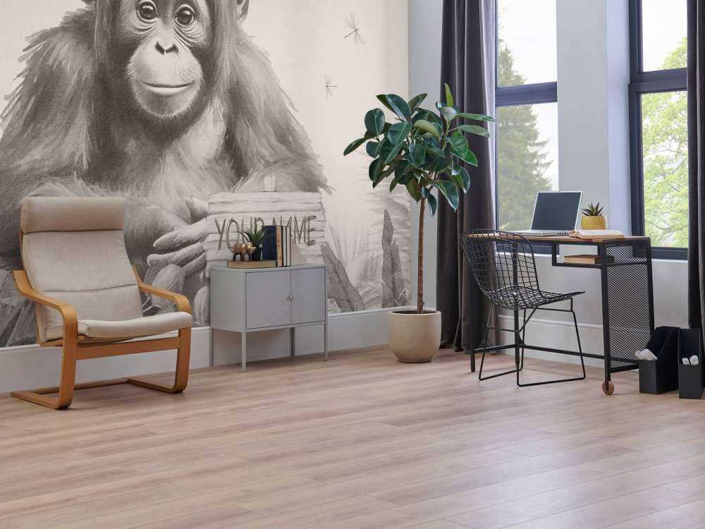 Baby orangutan in the jungle beige