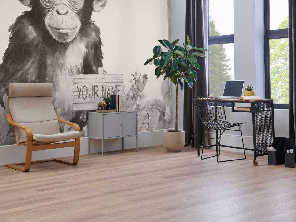 Baby chimpanzee in the jungle beige