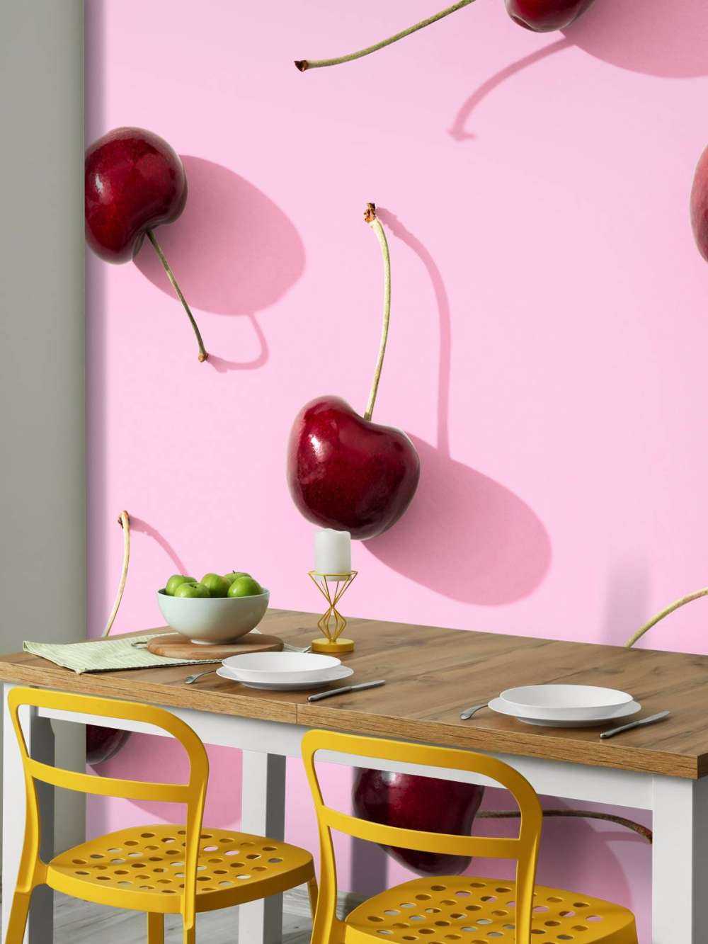 Cherries on pink background