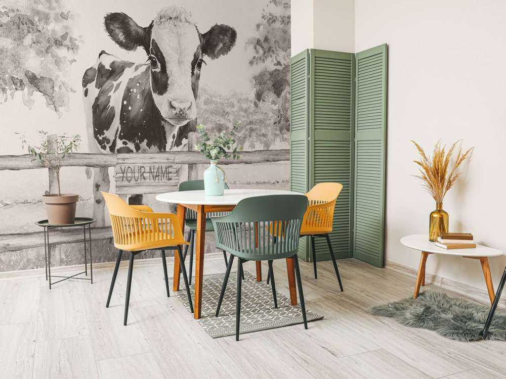 Baby cow in a field beige