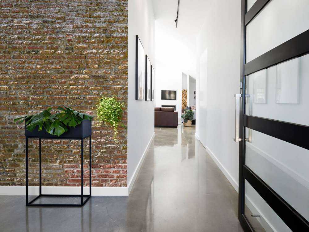 Old stone city wall with plants