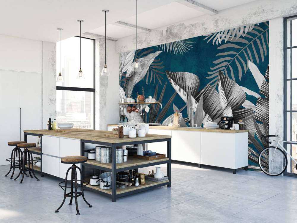 Tropical leaves on a blue background