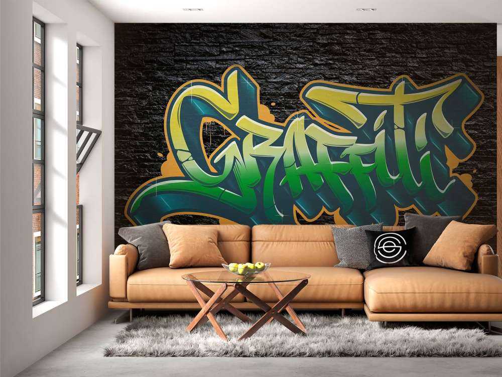 Graffiti on wall of black stones