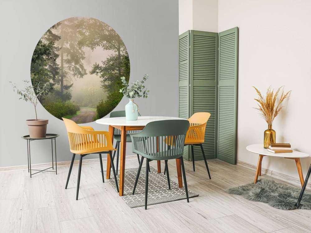 Road through foggy forest