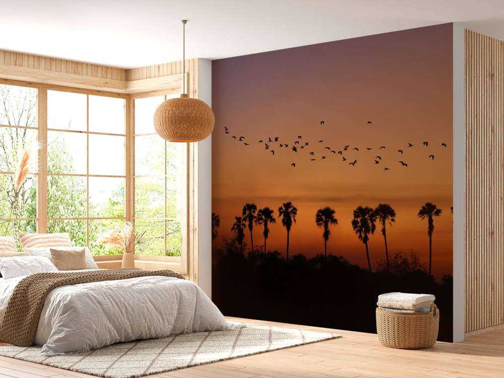 Palm trees with group of birds