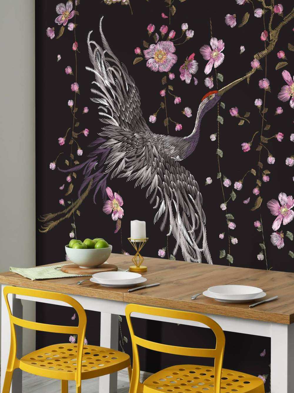 Cranes with pink flowers