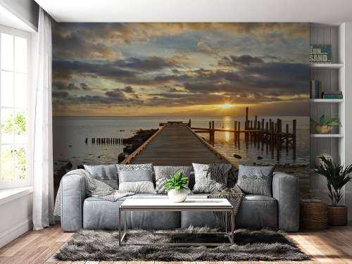 Wooden jetty with sunrise