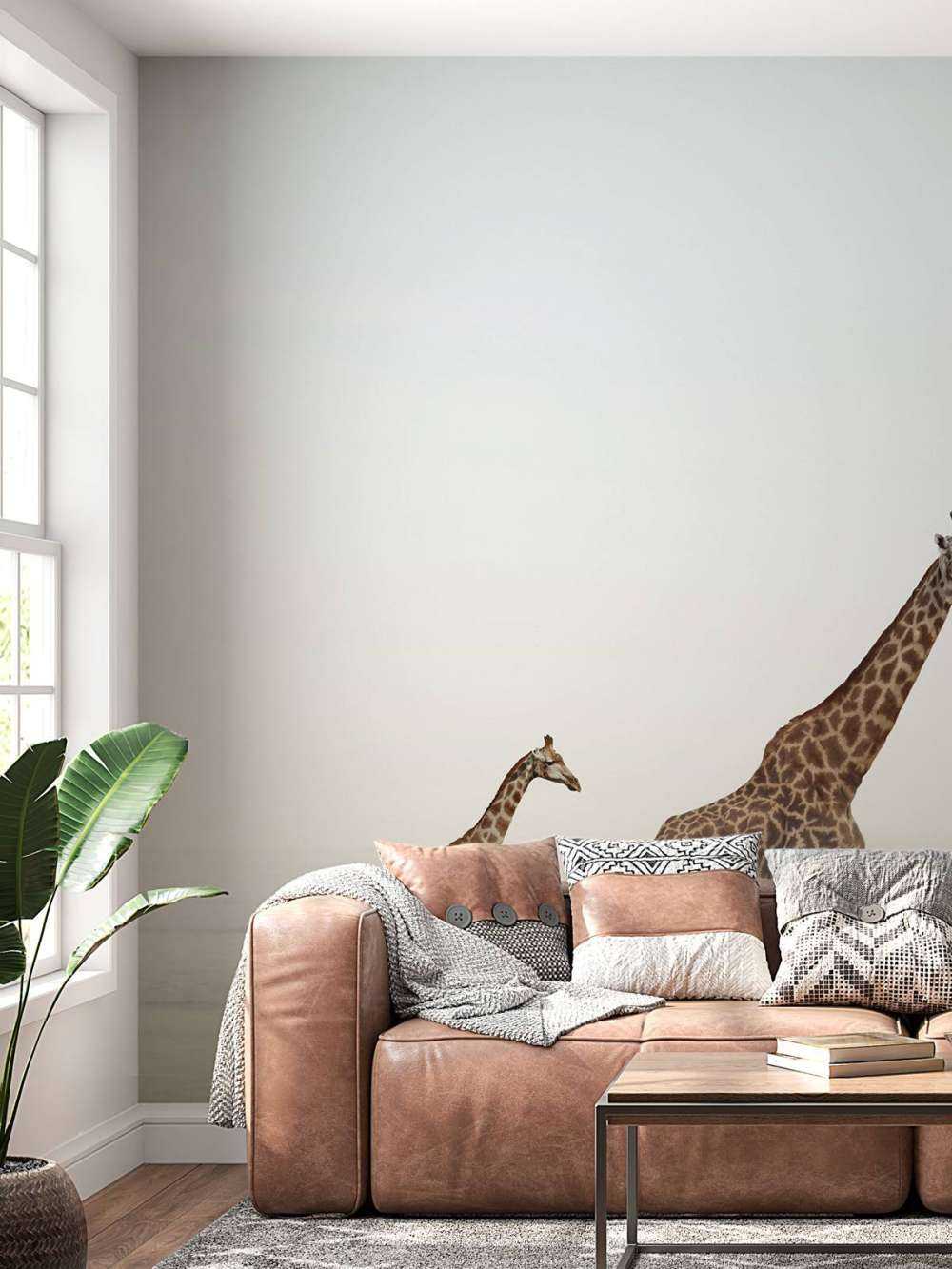 Giraffen op het strand