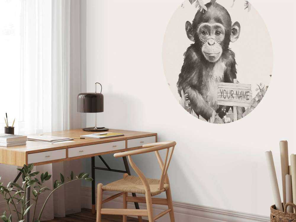 Baby chimpanzee in the jungle beige