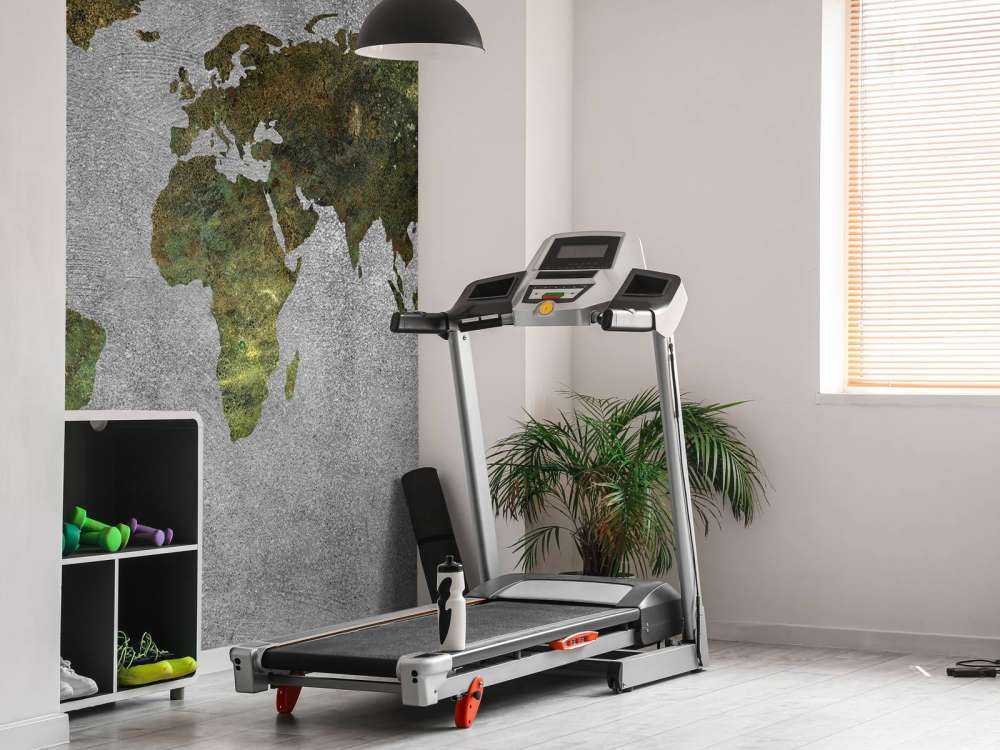 World map with green structure on grey concrete