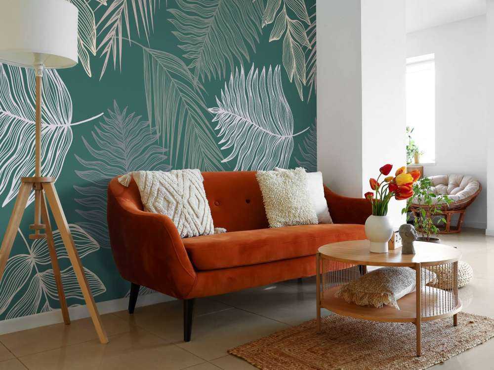 Palm leaf on green background