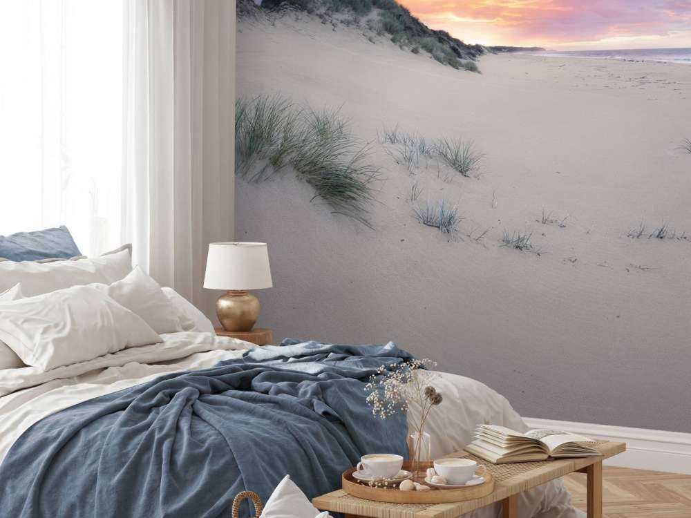 Sunrise over sand dunes