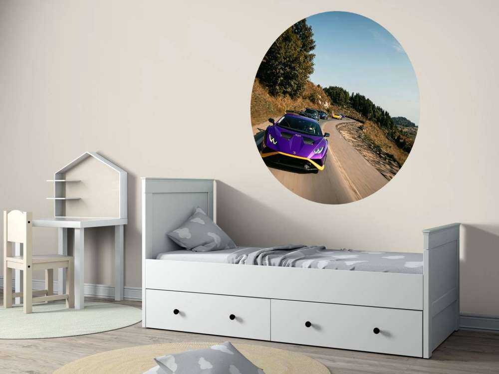 Supercar convoy through the mountains