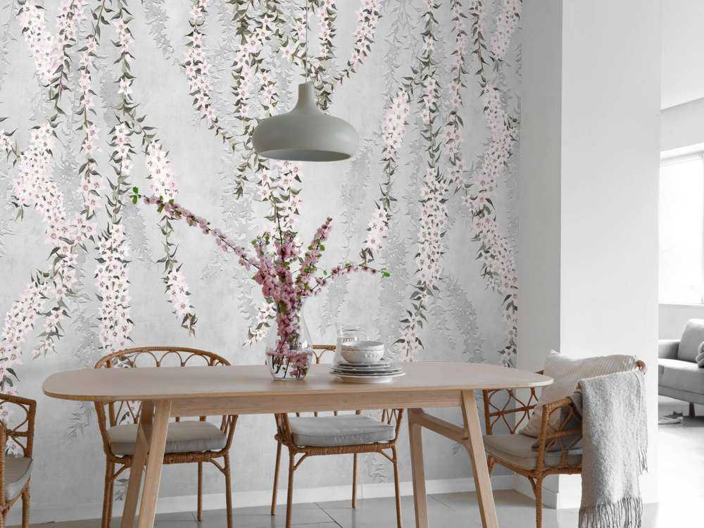 Flower branches on light blue concrete