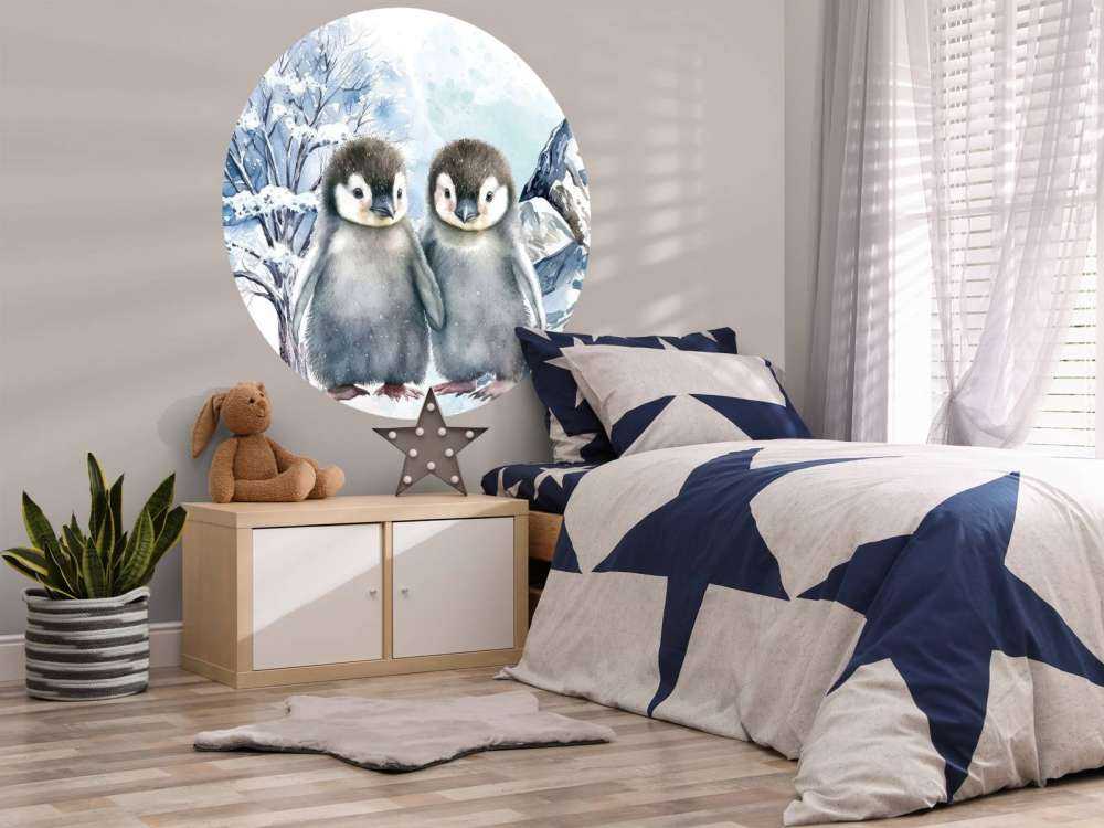 Cute penguins in winter landscape