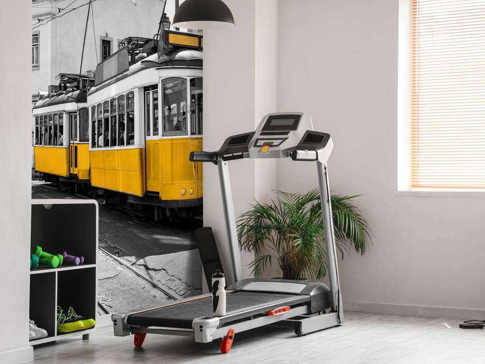 Yellow tram in a black and white street