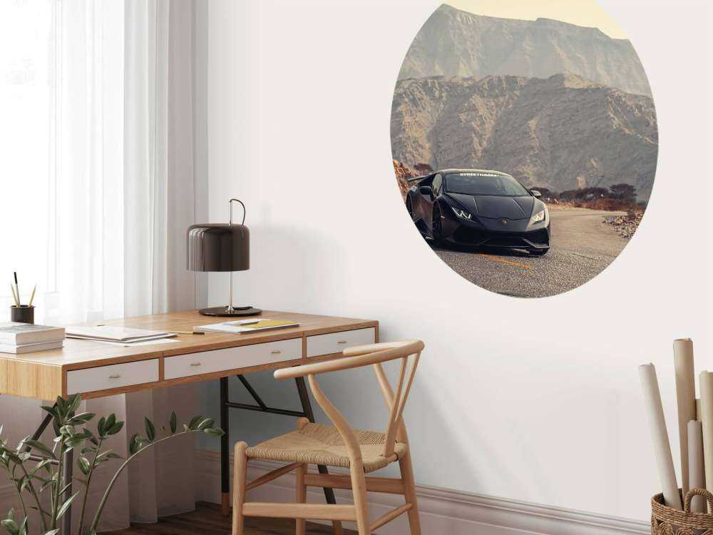 Black supercar in desert