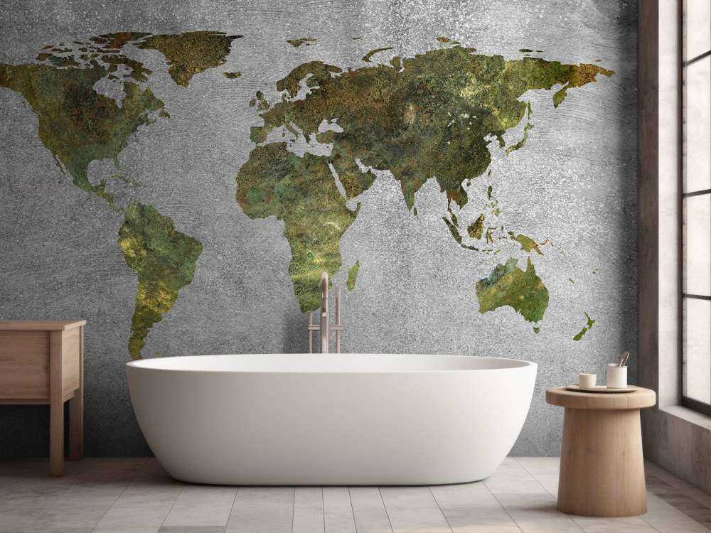 World map with green structure on grey concrete