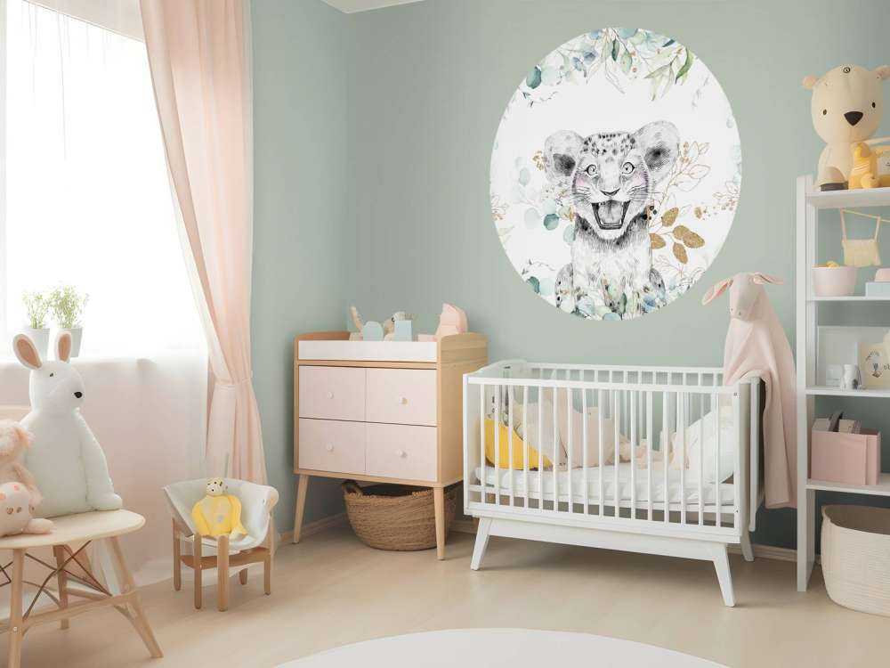 Baby lion with mint leaves