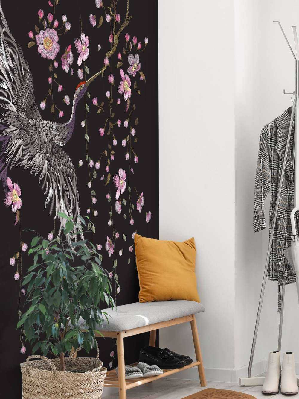 Cranes with pink flowers