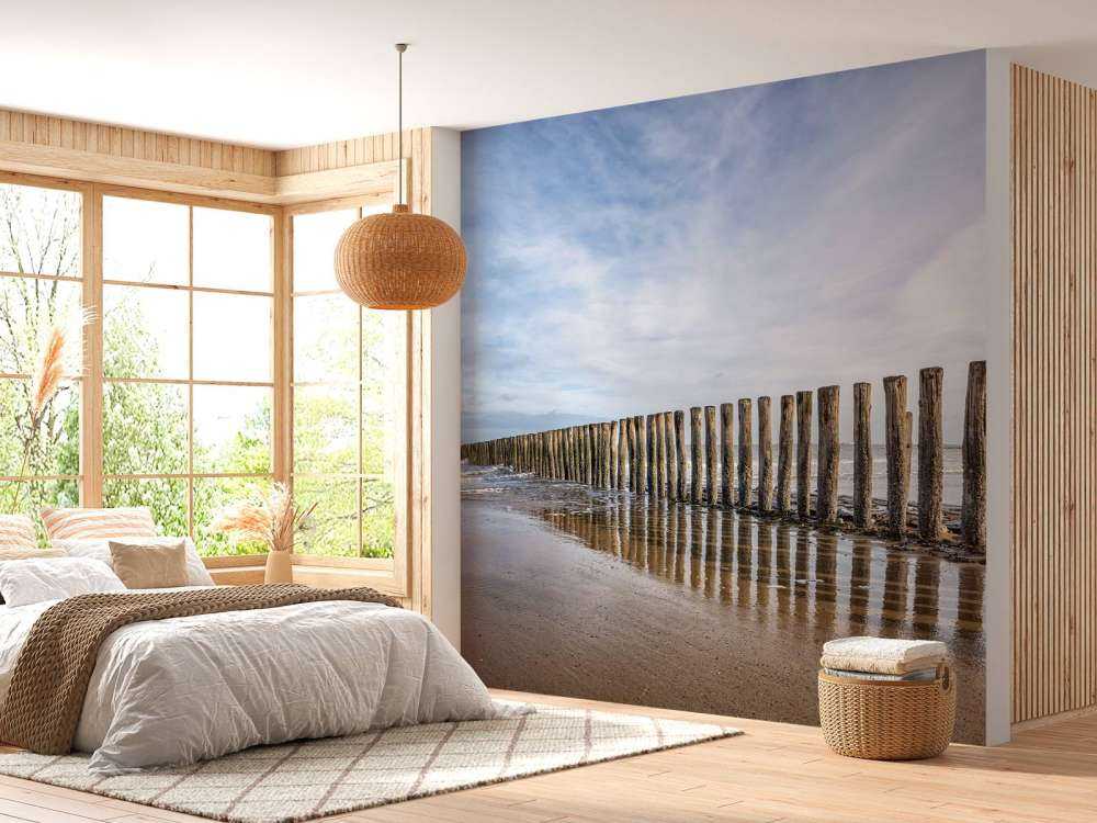 Wooden breakwater on the coast at Cadzand bath
