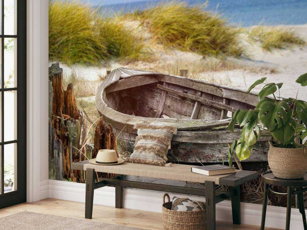 Old fishing boat, seagulls, beach and sea