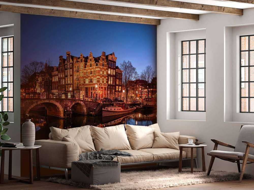 Illuminated houses along the canal