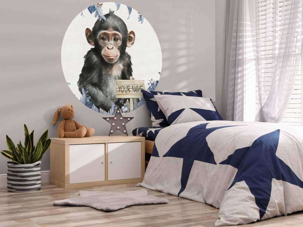 Baby chimp in the jungle blue