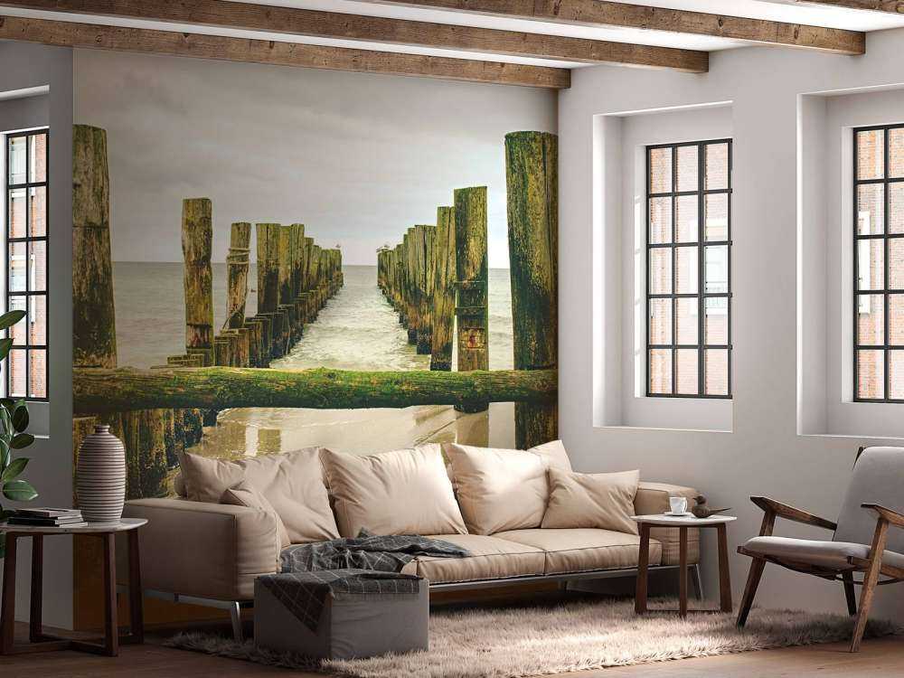 Mossy pile heads in the water